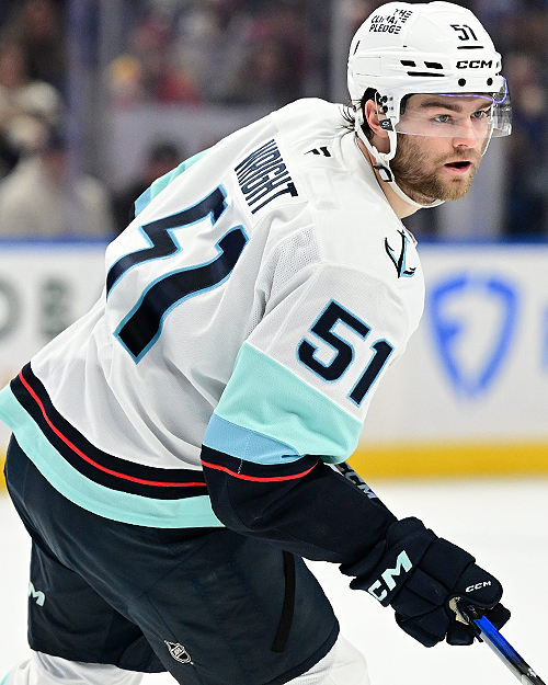 Kraken forward Shane Wright in his away jersey mid-play.